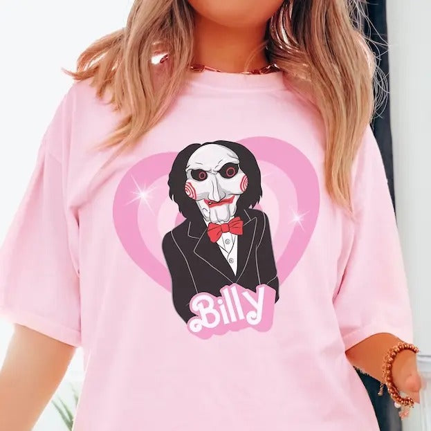 Billy doll tshirt, horror movie doll tshirt, funny Halloween graphic tee, pink spooky shirt, retro aesthetic, scary characters, saw jigsaw