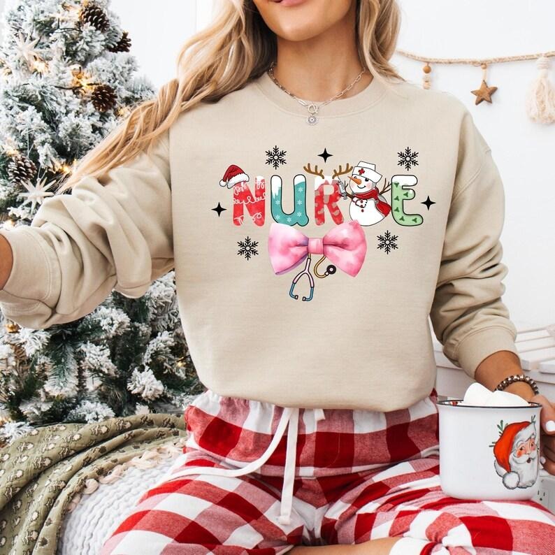 Coquette Bow Nurse Christmas Sweatshirt, Funny Santa Nurse T-shirt, ICU ER Rn Nurse Tee, Christmas Nurse Life Hoodie, Nurse Gifts