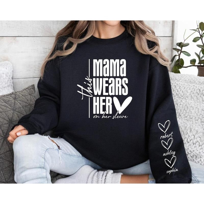 Custom This Mama Wears Her Heart On Her Sleeve Hoodie, Personalized Mom Sweatshirt With Kids Names, Cute Mama Hoodie, Mothers Day Gifts