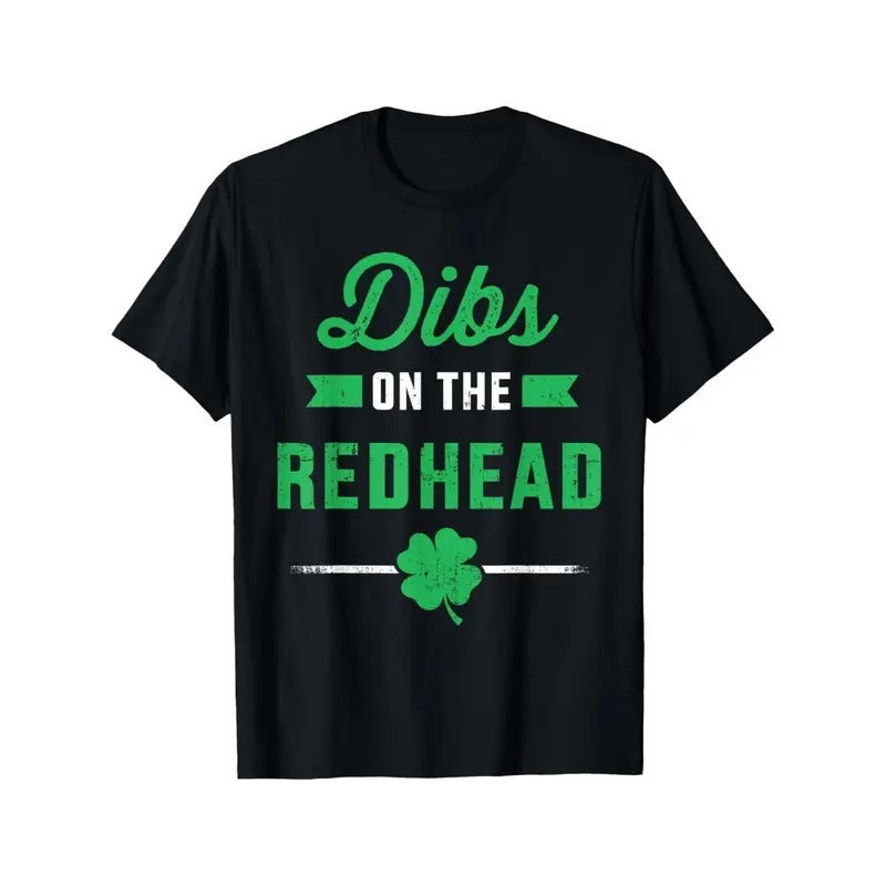 St. Patrick's Day 'Dibs on the Redhead' Funny Cotton T-Shirt – Black Casual Short Sleeve Tee with Shamrock Graphic, Comfortable Street Style for Adults, Street Style Tee | Playful Design | Comfortable Fit made in usa