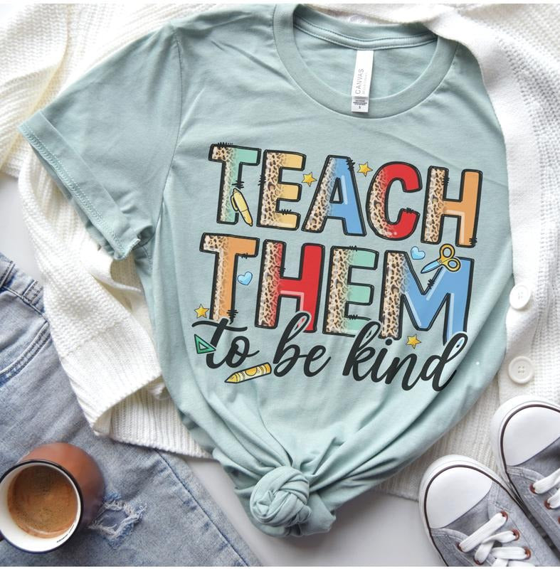 Teach Them to Be Kind T-Shirt Fun Teacher Tshirt Retro Teach Tee Be Kind T-Shirt Soft Print Tshirt Oversized Teacher Tee Comfy Soft T-Shirt Sublimation Print Tshirt Retro Teacher Tee Soft Print T-Shirt Fabric Top