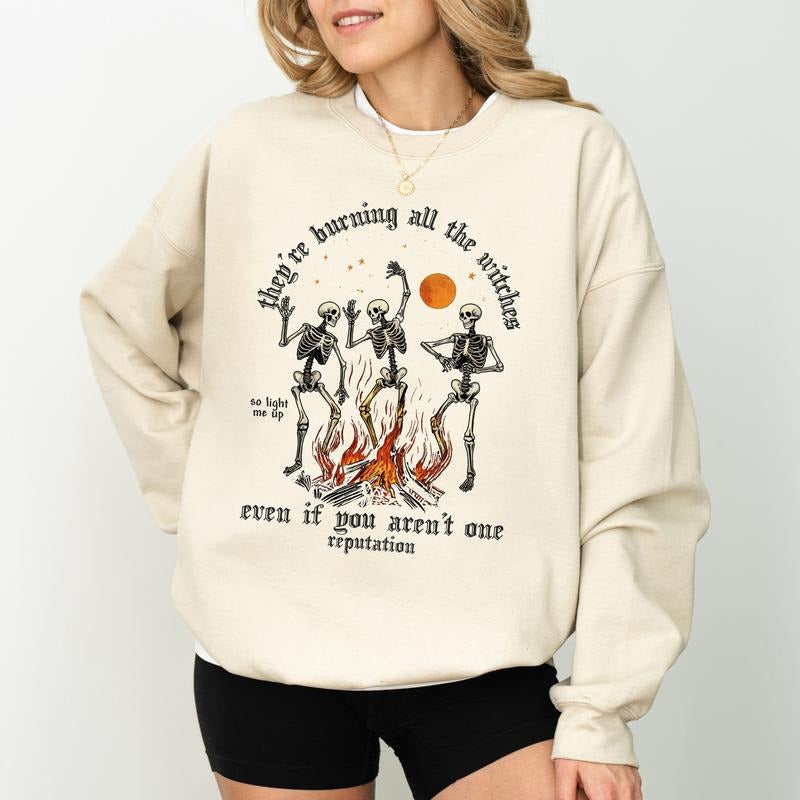 They're Burning All The Witches Sweatshirt, Even If You Aren't One Long Sleeves Pullover, Retro Skeleton Gifts, Cute Winter Clothing.
