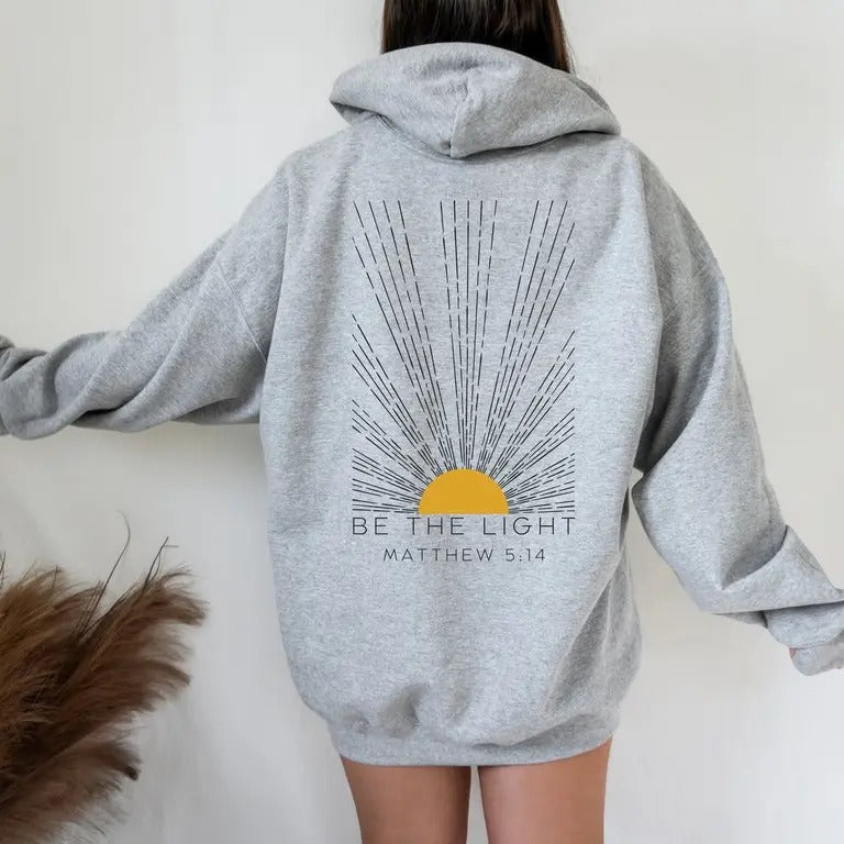 Be The Light Hoodie - Grey with Yellow Sun Design, "Matthew 5:14" Text, Comfortable Cotton Blend, Trendy Western Style, Female Christian Design