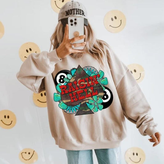 Camo Raisin Hell Crew sweatshirt, graphic tees women, western outfits women, western tops clothing, rodeo cowgirl outfits women, country concert outfits, shirt, sweatshirt, hoodie