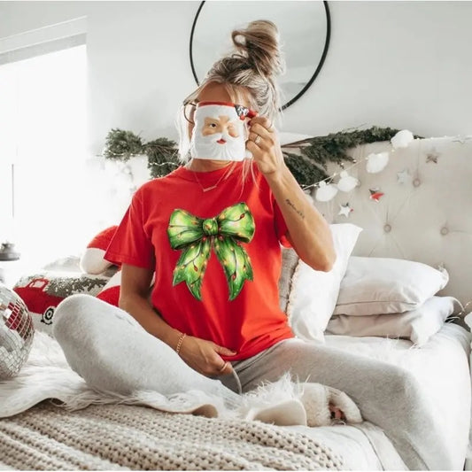 Comfort Colors Grinch Lights Coquette Bow Women's Short Sleeve Graphic T-Shirt - Top, Womenswear