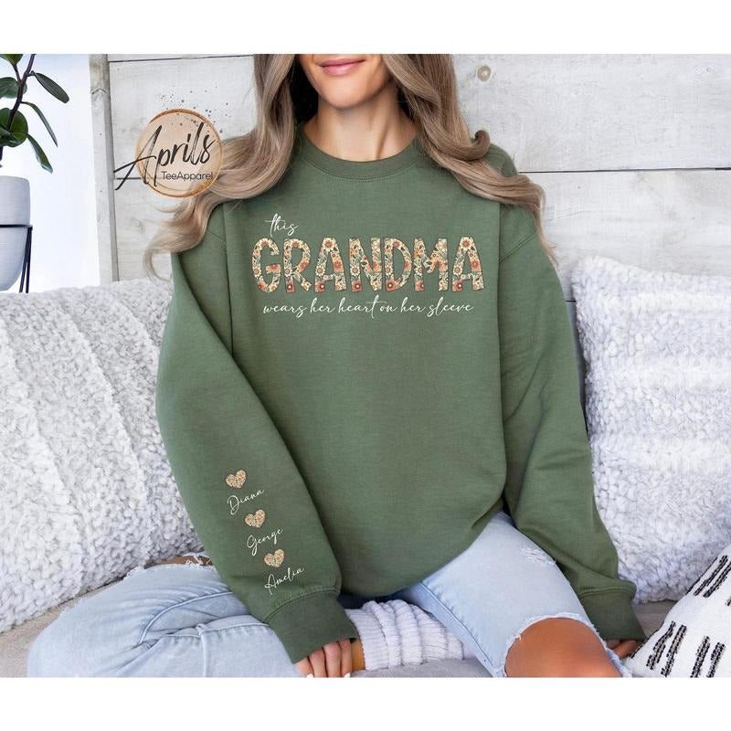 Custom This Grandma Wears Her Heart On Her Sleeve Sweatshirt, Shirt with Names On Sleeve, Mommy Heart Hoodie, Valentine's Day Grandma Gift