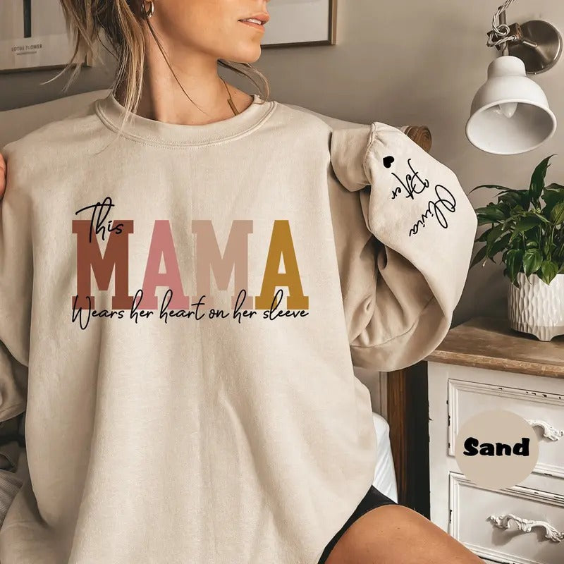 Custom This Mama Wears Her Heart On Her Sleeve Sweatshirt, Personalized Mom Sweatshirt With Kids Names, Cute Momma Outfit, Mothers Day Gifts