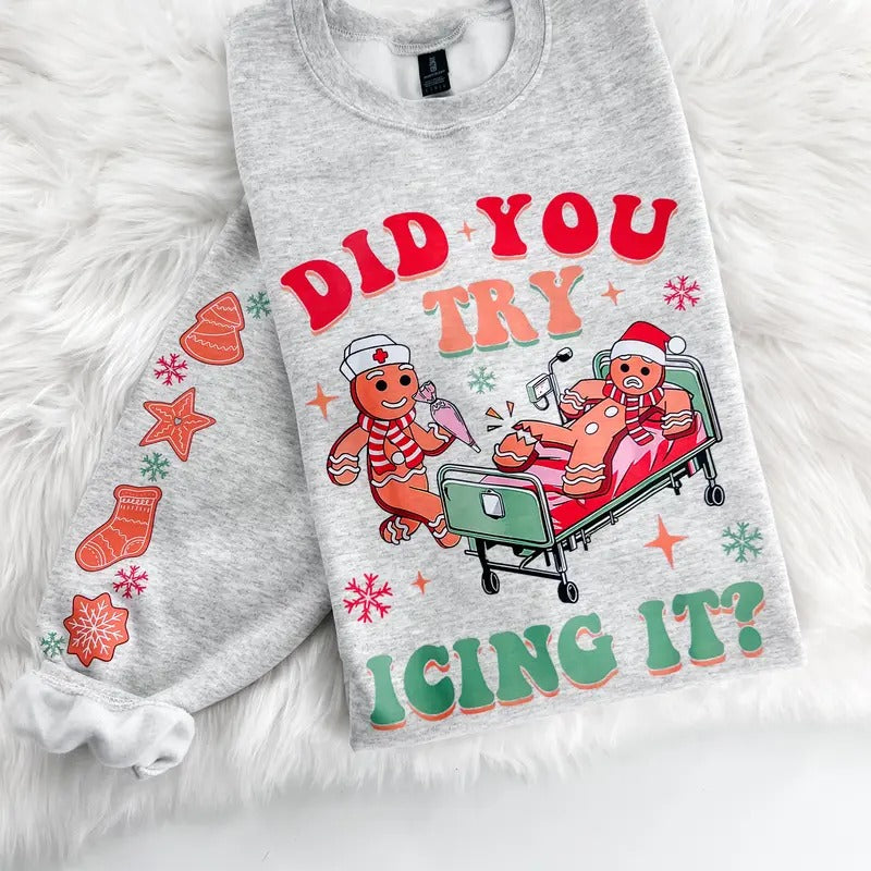 Did you try Icing it Gingerbread Nurse Sweatshirt or Hoodie with sleeve print Comfy Sublimation Tops Menswear Unisex Oversized Pullover