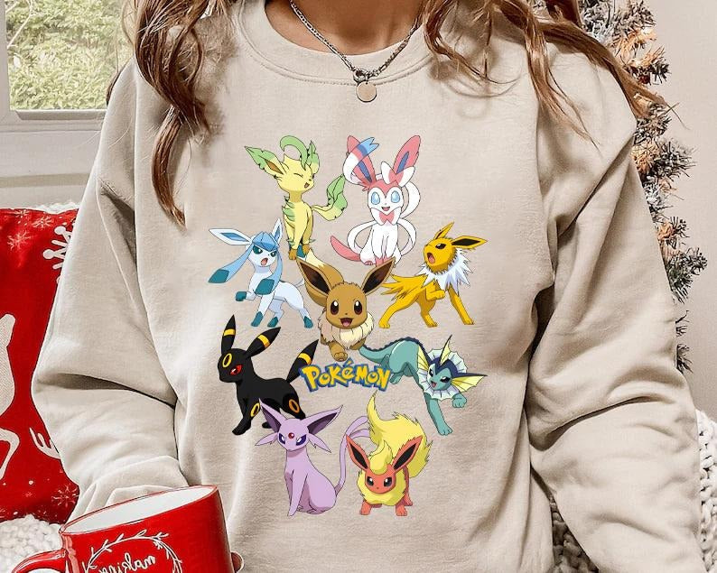 Eevee Pokemon Sweatshirt, Eevee Eeveelution Sweatshirt, Eevee Evolutions Shirt, Slyveon, Umbreon, Espeon, Flareon Anime, Vintage Anime Sweater, Anime lover gift, Anime merch, Anime Lover Sweatshirt, Gift for anime fan, Sweater, Anime Gift, Kawaii