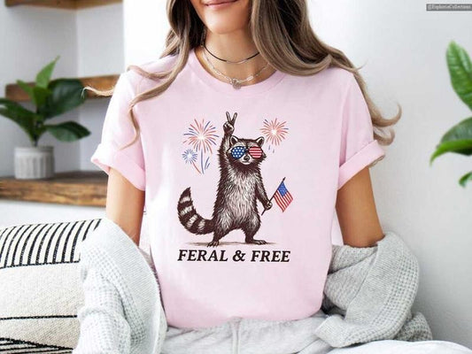 Feral & Free Raccoon Funny 4th of July T-Shirt, American Feral Girl Summer Meme Shirt, Patriotic Independence Day Gift , Global Trending Outfits