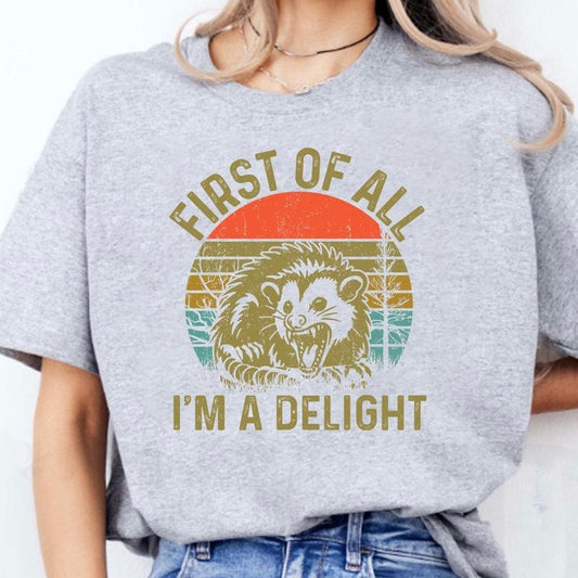 First Of All I'm A Delight Shirt, Angry Possum Shirt, Sarcastic Quotes Shirt, Possum Lover Gift, Funny Saying Tee, Short Sleeve Crew Neck Top, Casual Clothing funny  graphic  tees