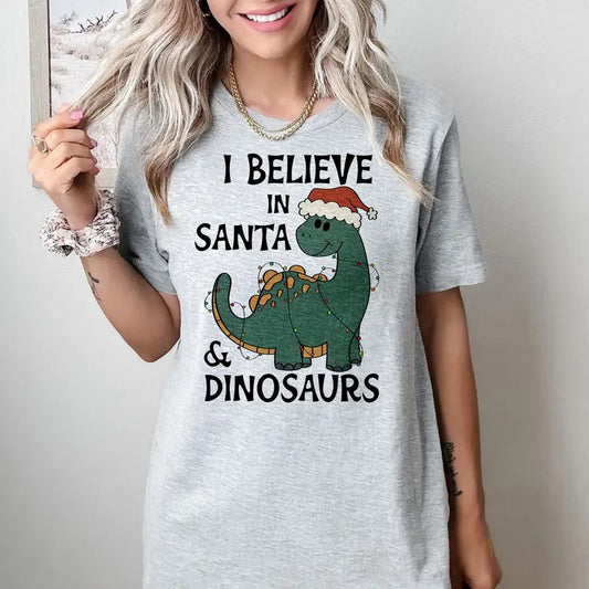 I believe in Santa and Dinosaurs - T-Shirt -  Print is Sublimation, Unisex T-Shirt, Funny Tee,Gift Idea, Womenswear Graphic Top Cute