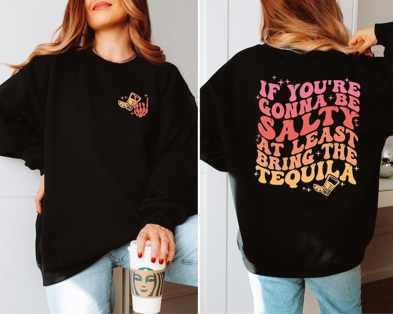 If You're Gonna Be Salty At Least Bring The Tequila Sweatshirt, Funny Drinking Quote Sweatshirt, Trendy Sweatshirt, Summer vintage T-shirt, sweater and Hoodie cotton shirt