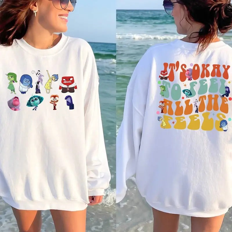 It's Okay Sweatshirt - White Casual Sweatshirt with Colorful Graphic Design, Featuring Various Characters, Ideal for Women's Wear