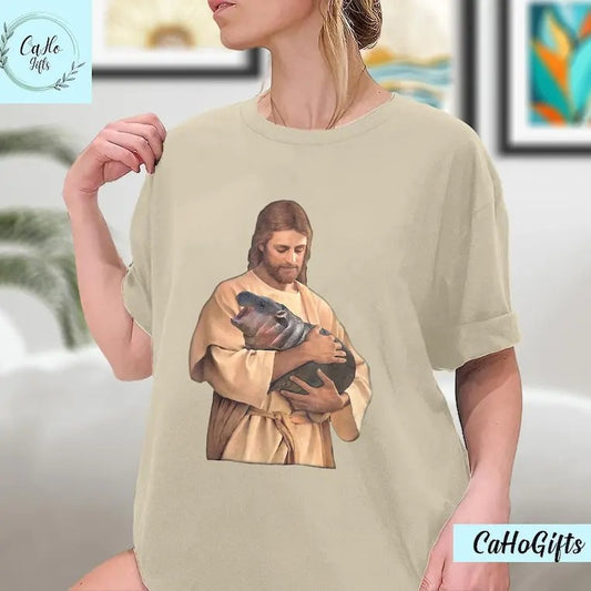 Jesus Moo Deng Shirt, Jesus Loves Moo Deng Bouncy Pig Cute Baby Hippo Meme T-Shirt, Moo Deng Shirt, Sweatshirt, Hoodie