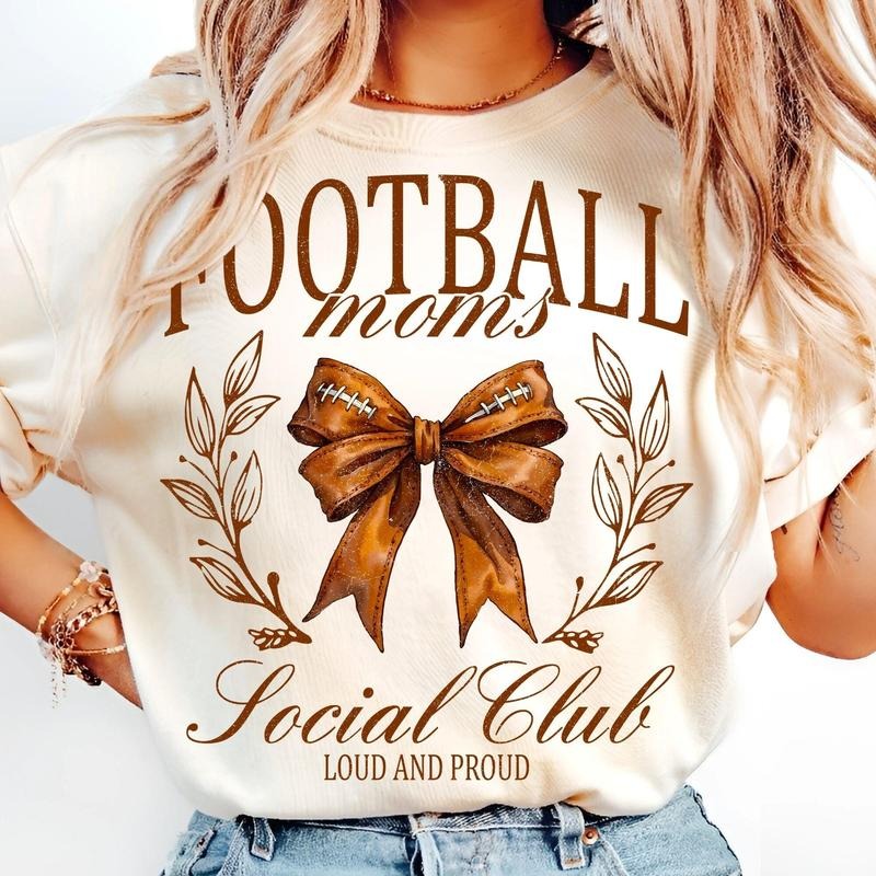 [Sale To 45% Off] Football Mom Social Club T-Shirt, Coquette Bow Retro Watercolor Football T-Shirt, Game Day Sidelines