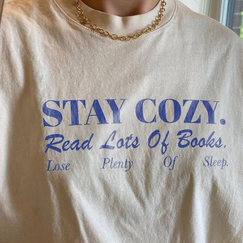 Stay Cozy Read Books Shirt, Funny Bookish T-Shirt Book Lover Book Addict Romance Reader Light Academia Simple Bookish Gift DFLBP
