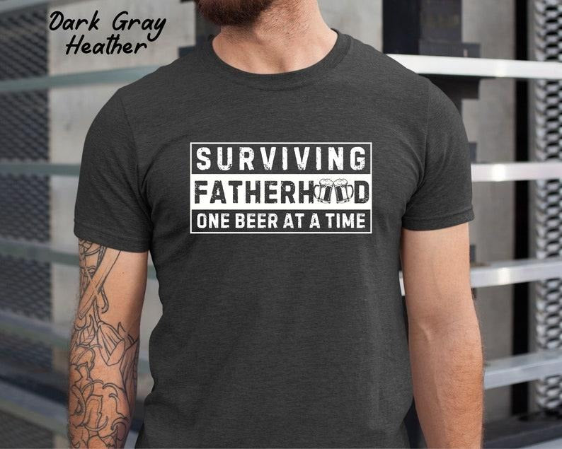 Surviving Fatherhood One beer at a time Dad Shirt/T-shirt/Hoodie/Sweater, Funny Dad Shirt, New Dad T shirt, Father's Day Gift, Gift For Husband, Dad Life Shirt style 02
