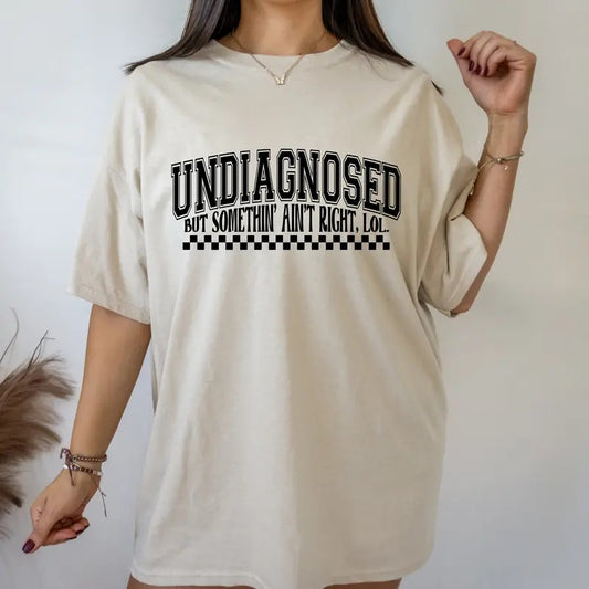 Undiagnosed but Something; Ain't Right- T-Shirt -  Print is Sublimation, Unisex T-Shirt, Funny Tee,Gift Idea, Relaxed Fit, Casual Apparel, Great with Jeans, Womenswear Graphic