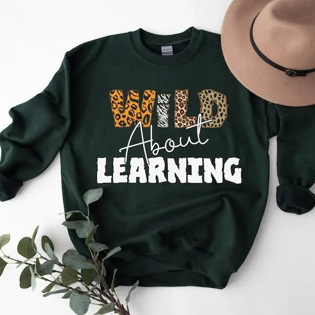 Wild About Learning At School Shirt, 2024 Funny First Day Of School Shirt, Teacher Love Inspire Tshirt Fabric Casual Classic